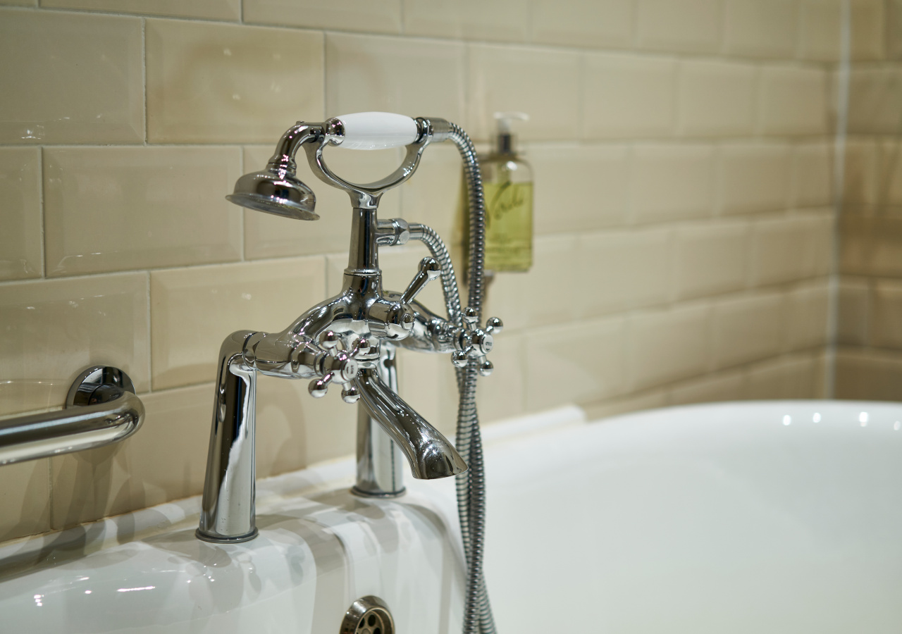 Close up of taps in hotel bathroom