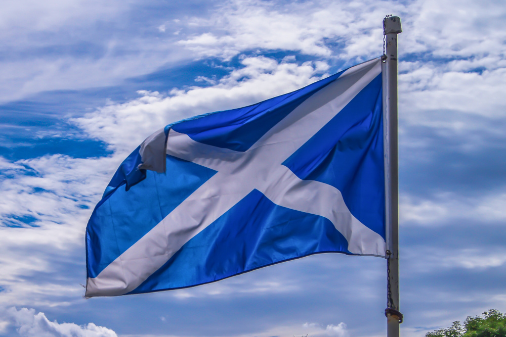 The Scottish Flag flying on a windy day.